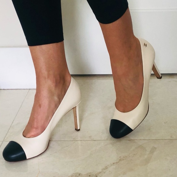 CHANEL Shoes - CHANEL Two-Tone Cap -Toe Pumps in Cream and Black .Size 39